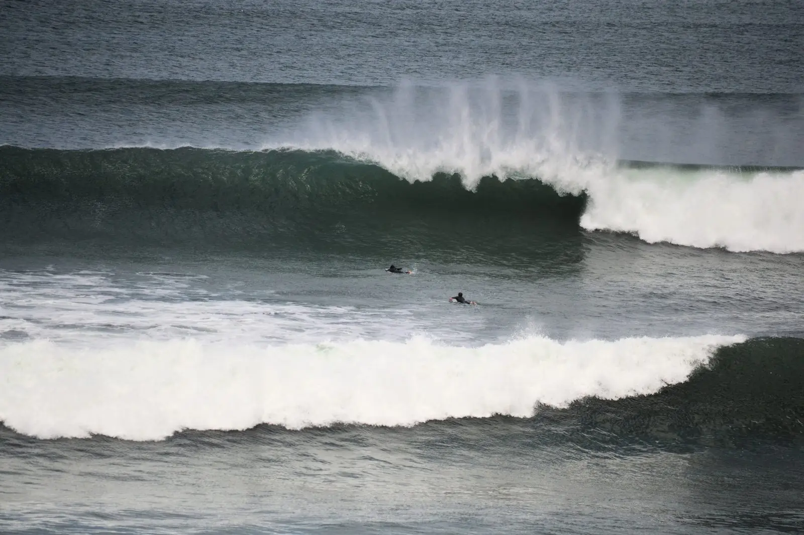 A clean wave breaking in Ericeira